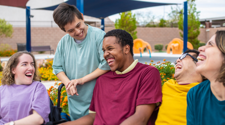 a group of people laugh together