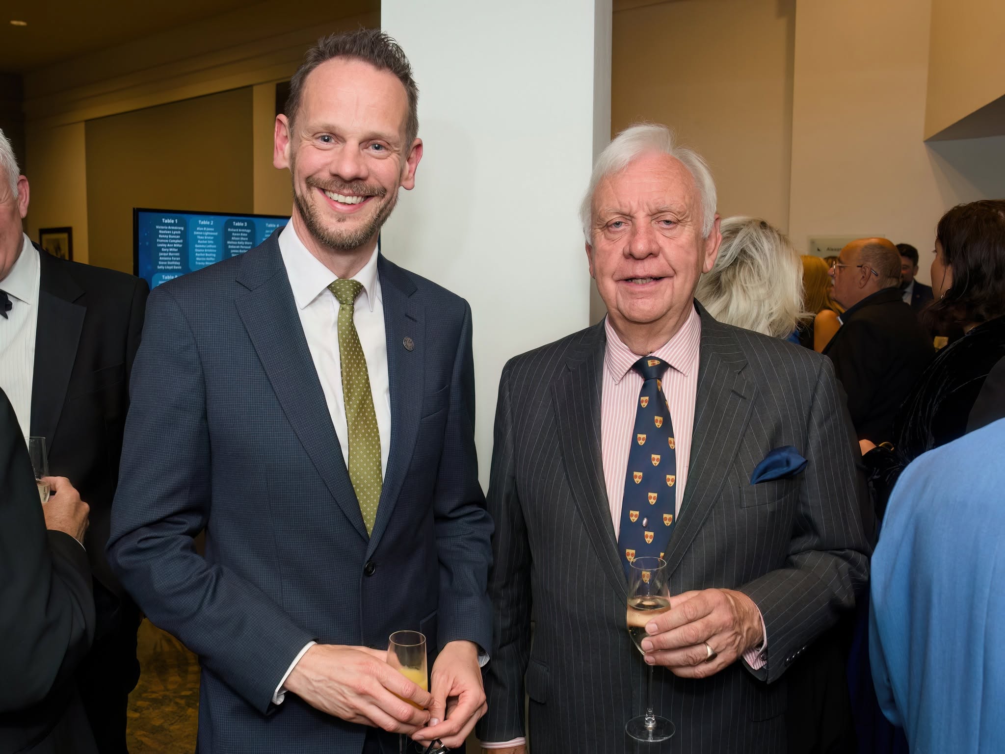 Simon and Alan stand together at an awards show