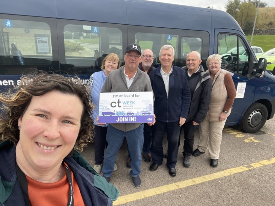 Nicola Mitchell (Development Officer for Scotland at CTA) is pictured with various people, including Colin, standing outside the organisation's ambulance vehicle with a sign reading "I'm on board for CTWeek".
