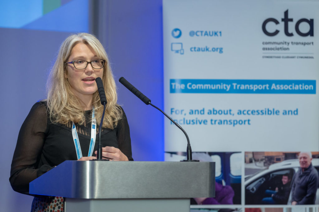 Woman speaking at the National Assembly for Wales