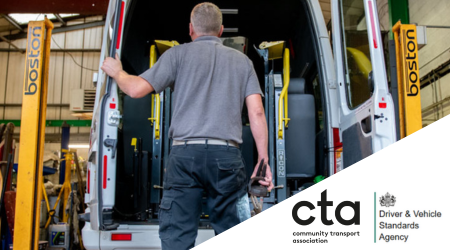Image shows a man standing next to a community transport vehicle. 
