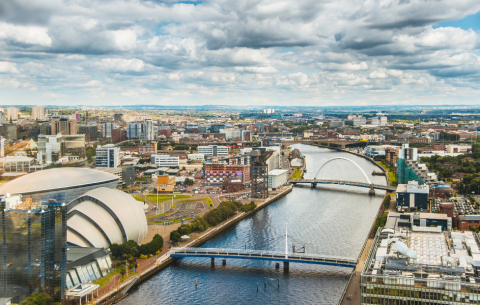 Image of scenery in Glasgow featuring bridges and a river