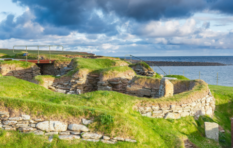 An image of the Broch of Gurness in Orkney on a sunny day