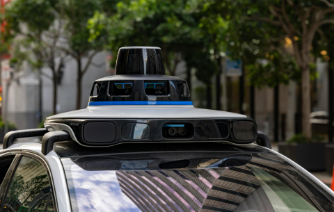 Image of the top of an Autonomous Vehicle showing a camera system on top of the car